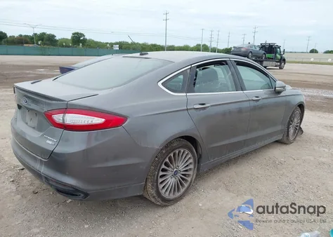 2014 Ford Fusion Titanium z USA, uszkodzony, nr VIN 3FA6P0D98ER360130
